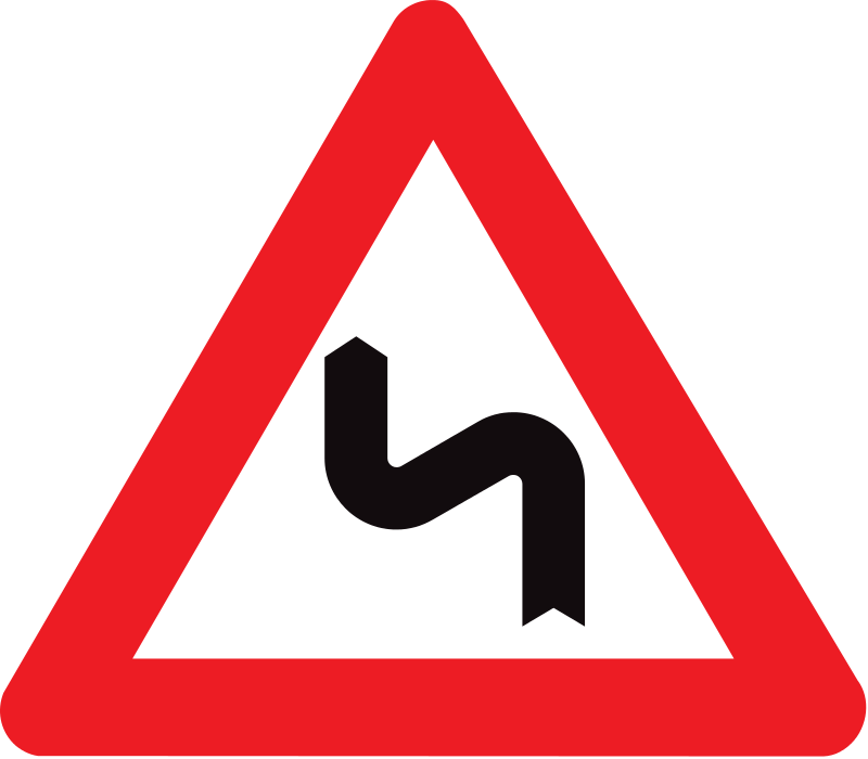 verkeersbord gevaarbord dubbele bocht of opeenvolging van meer dan twee bochten, de eerste naar links.
